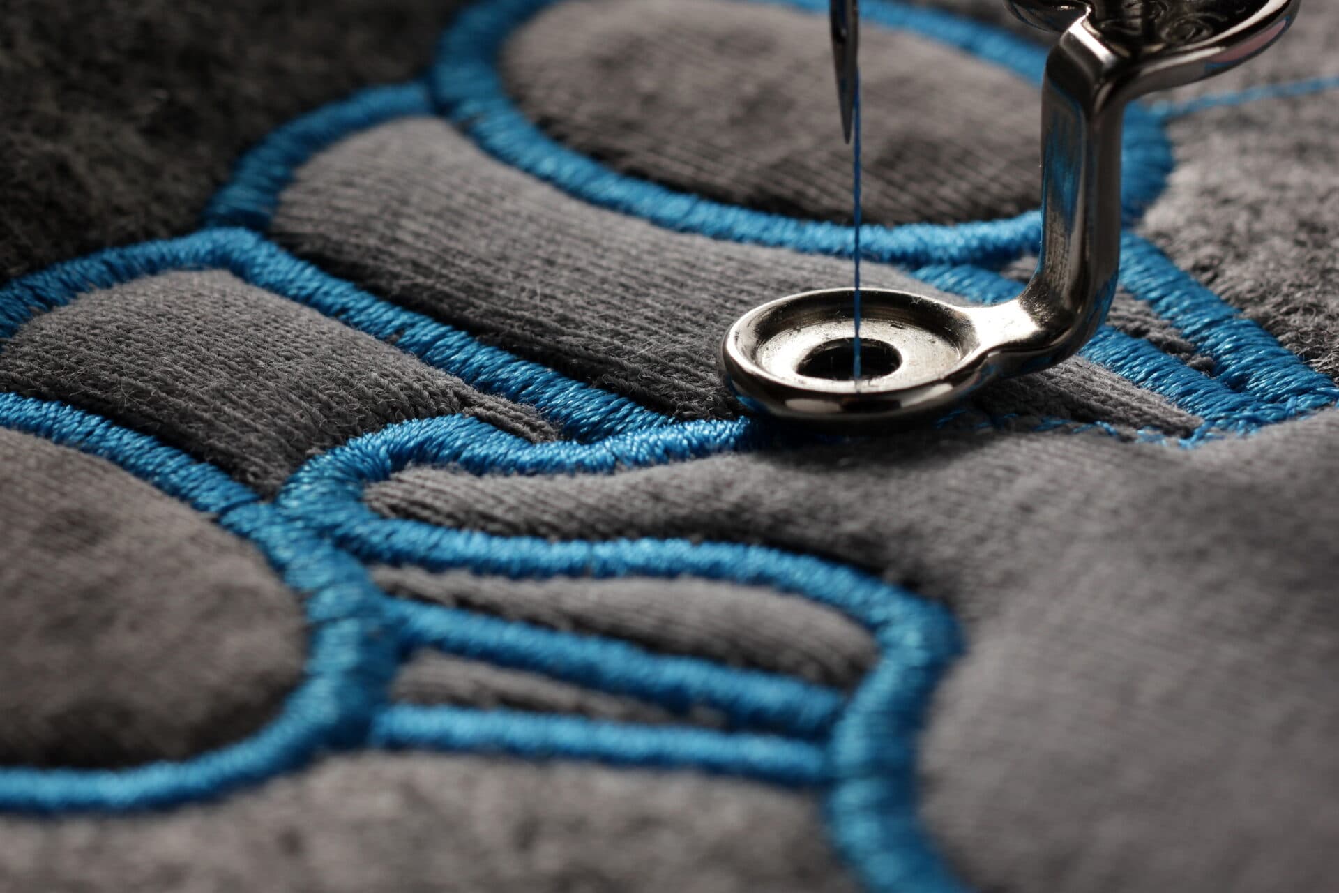 Detalle macro de bordado azul